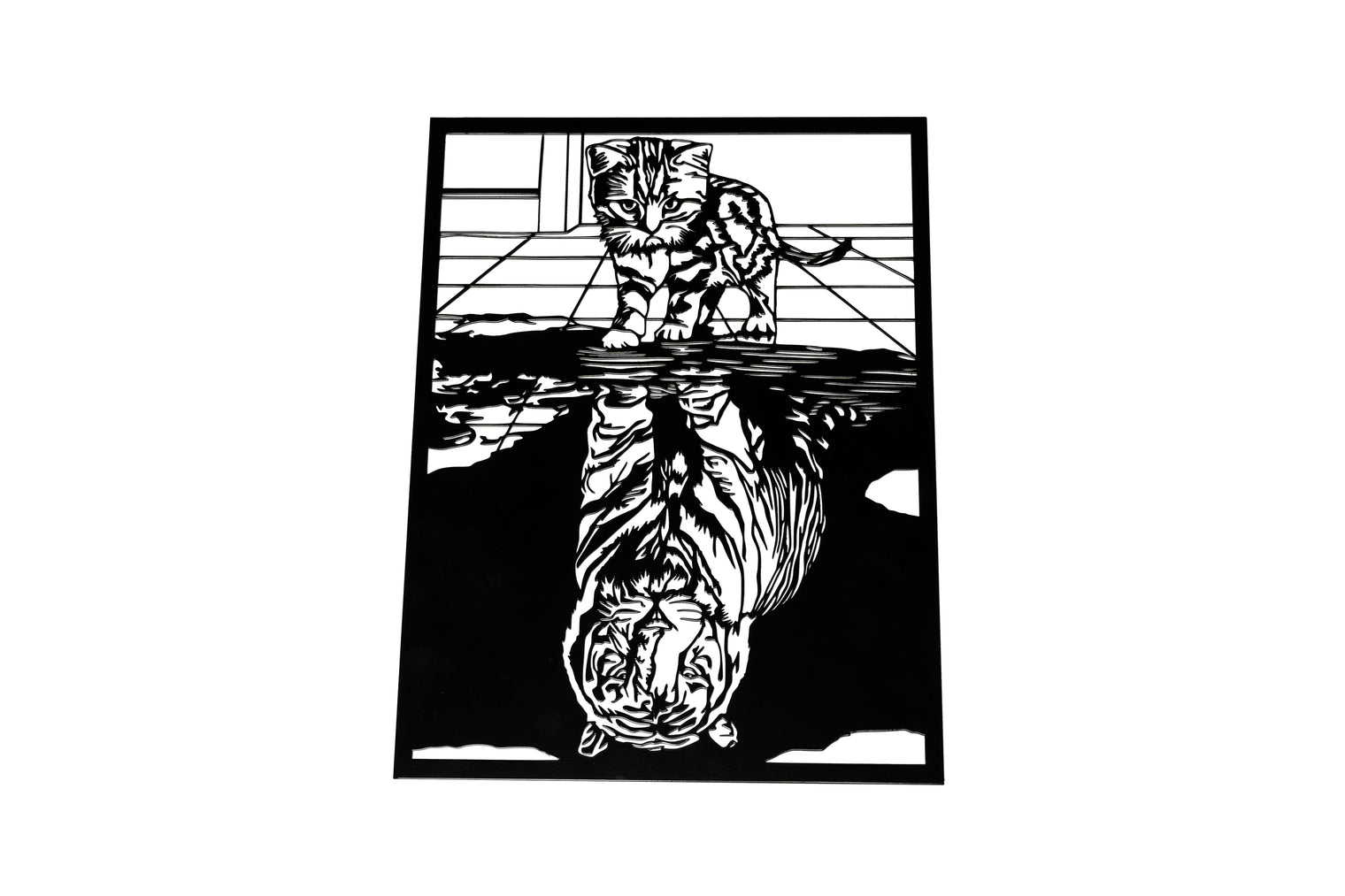 Chaton qui se voit en tigre